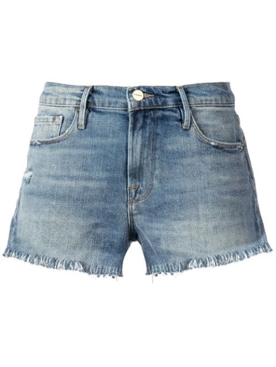 Shop Frame Le Cut Off Shredded Raw Denim Shorts In Blue