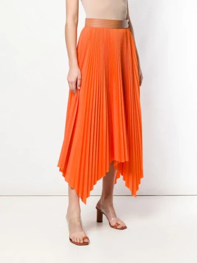 Shop Loewe Pleated Skirt In Orange