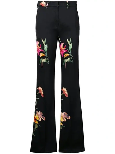 Shop Etro Floral Print Flared Trousers In Black