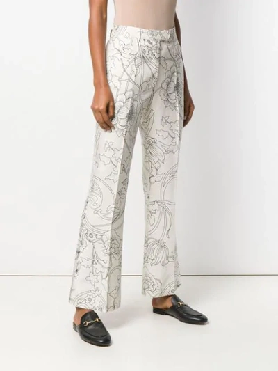 Shop Etro Floral Print Flared Trousers In Neutrals