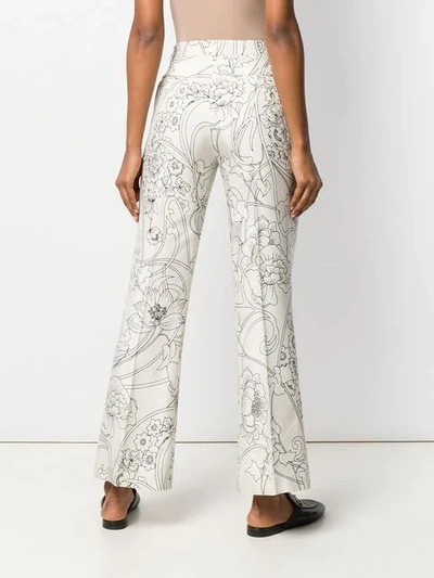 Shop Etro Floral Print Flared Trousers In Neutrals