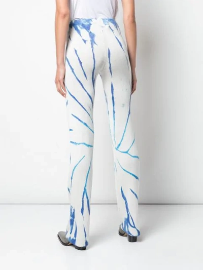 Shop The Elder Statesman Cyclone Dyed Silk Flared Trousers In White
