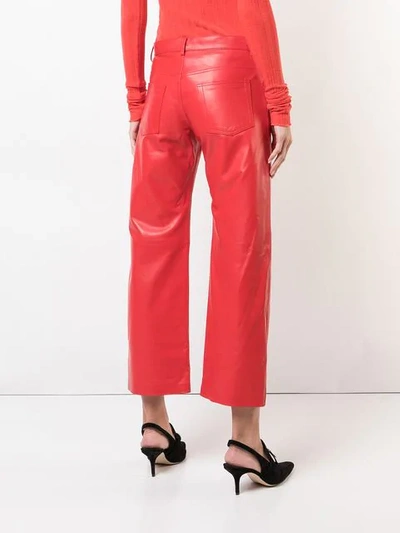 Shop Khaite Cropped Trousers In Red