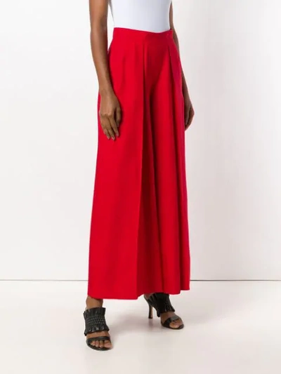 Shop Talbot Runhof Creased Palazzo Trousers In Red