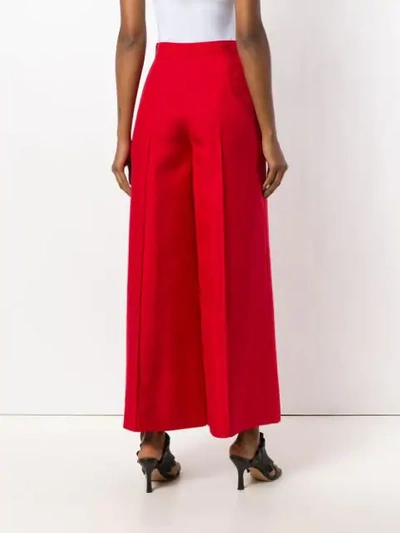 Shop Talbot Runhof Creased Palazzo Trousers In Red