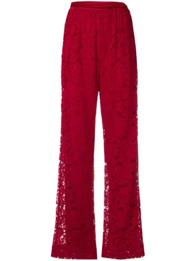 Shop Dolce & Gabbana Floral Lace Wide Trousers In Red