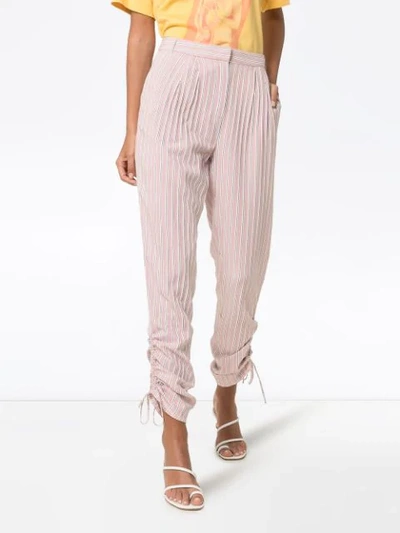 Shop Tibi Striped Drawstring-gathered Trousers In Pink