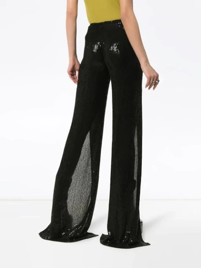 Shop Ashish Sequin Embellished Split Front Trousers In Black