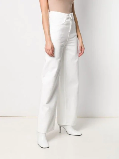 Shop Moncler Wide-leg Jeans In White