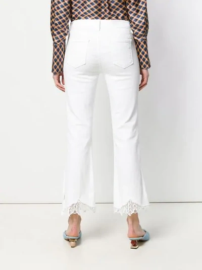 Shop J Brand Lace Hem Jeans In White