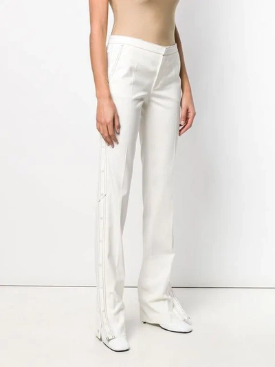 Shop Red Valentino Contrast Stitch Bootleg Trousers In Neutrals