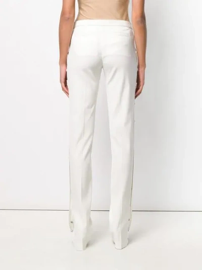 Shop Red Valentino Contrast Stitch Bootleg Trousers In Neutrals