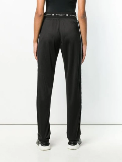 Shop Givenchy Regular Fit Track Trousers In Black