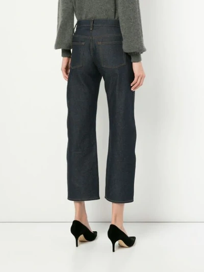 Shop Khaite Wendell Cropped Wide Leg Jeans In Blue