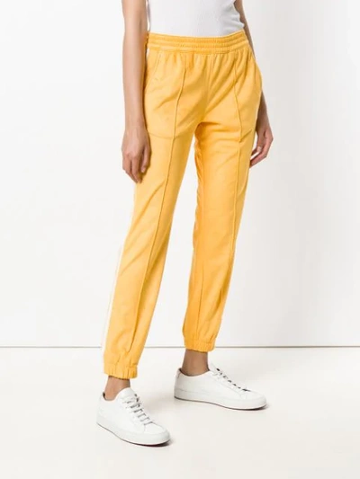 Shop Adidas Originals Adidas Cuffed Track Trousers - Yellow