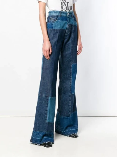 Shop Diesel Black Gold Patchwork Bootcut Jeans - Blue