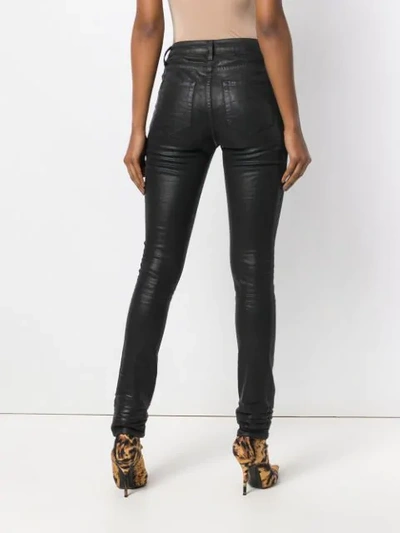Shop Saint Laurent Leather-look Skinny Jeans In 1170 Black