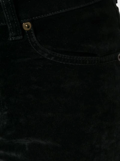 Shop Saint Laurent Slim Fit Velvet Trousers - Black