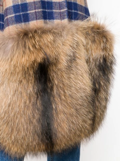 fur-panelled plaid coat