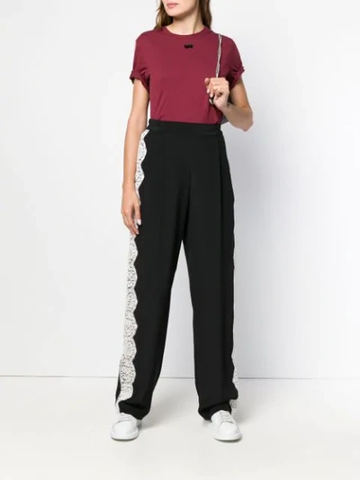 Shop Stella Mccartney Scalloped Lace Trimmed Trousers In Black