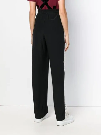Shop Stella Mccartney Scalloped Lace Trimmed Trousers In Black
