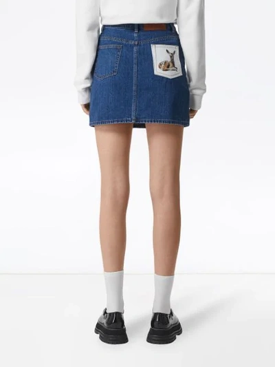 Shop Burberry Deer Motif Japanese Denim Mini Skirt In Mid Blue