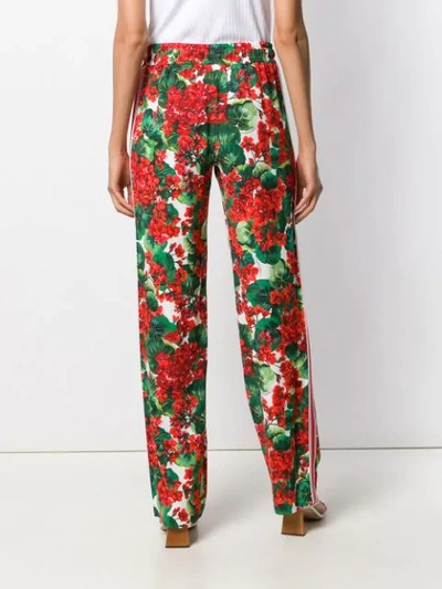 Shop Dolce & Gabbana Floral Print Track Trousers In Red