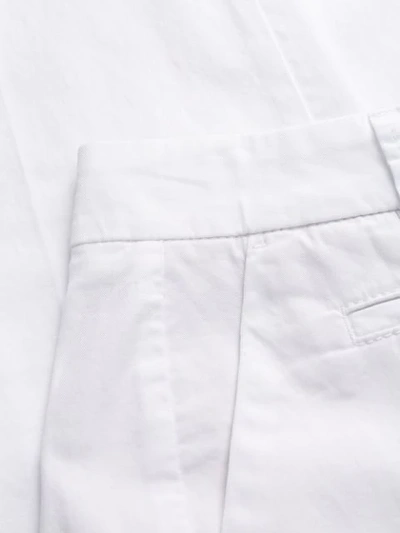 Shop Cambio Creased Tapered Trousers In White