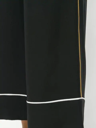 Shop Fendi Contrast Piping Cropped Trousers In Black