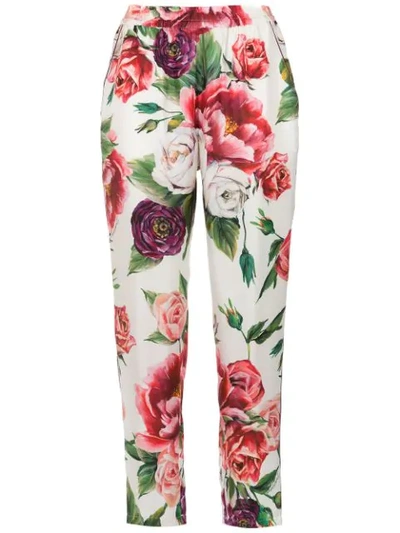 Shop Dolce & Gabbana Floral Print Trousers In White