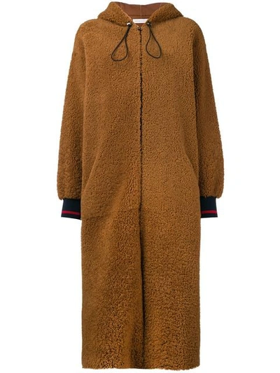 Shop Inès & Maréchal Hooded Shearling Coat In Brown