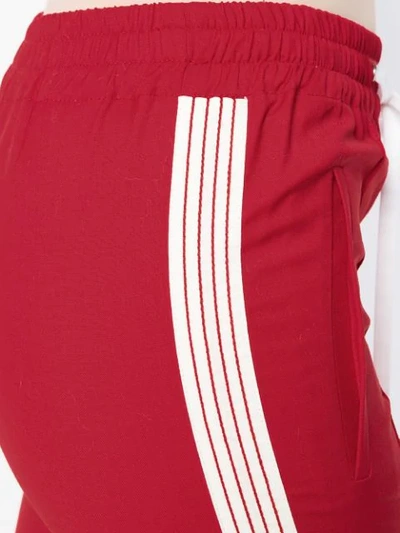 Shop Miu Miu Side-stripe Track Pants In Red
