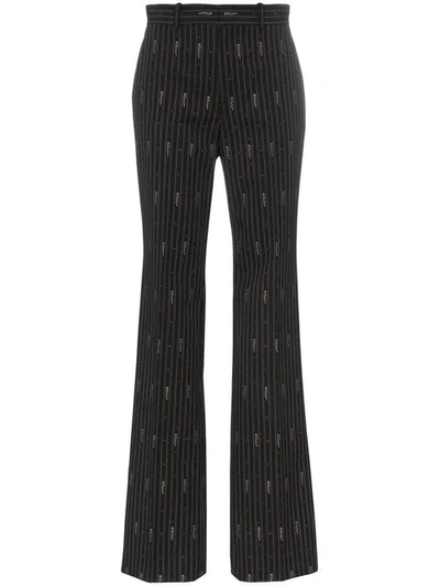 Shop Gucci Slim Fit Pin Stripe Trousers In Black