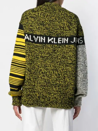 Shop Calvin Klein Jeans Est.1978 Colour Block Oversized Jumper In 099 Black Yellow Melange
