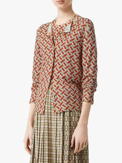 Shop Burberry Monogram Print Merino Wool Cardigan In Red