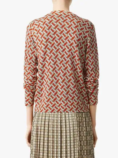 Shop Burberry Monogram Print Merino Wool Cardigan In Red