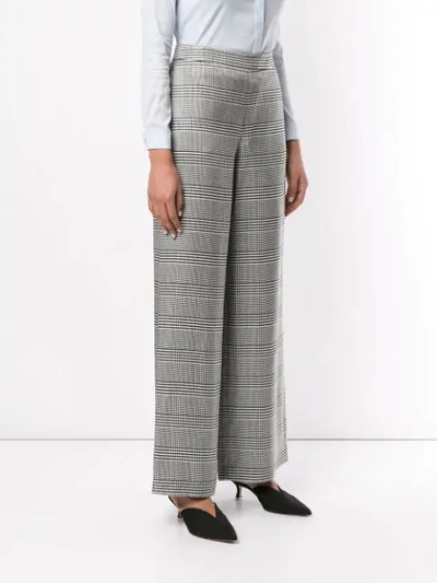 Shop Layeur Check Print Trousers In Grey