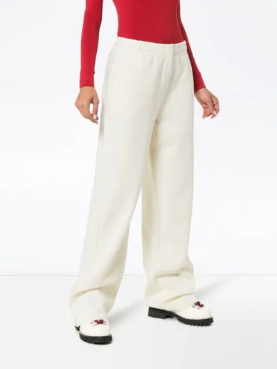 Shop Moncler Knitted Virgin Wool Track Pants In White