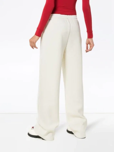 Shop Moncler Knitted Virgin Wool Track Pants In White