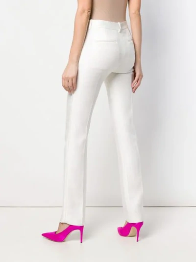 Shop Victoria Beckham Satin Tuxedo Trousers In White