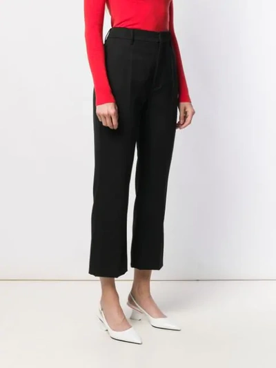 Shop Prada Flared Cropped Trousers In Black