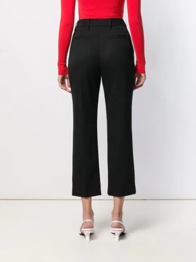 Shop Prada Flared Cropped Trousers In Black