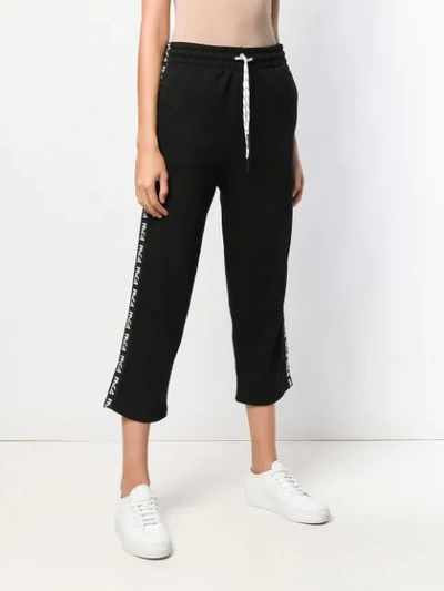 Shop Mcq By Alexander Mcqueen Drawstring Cropped Track Trousers In Black