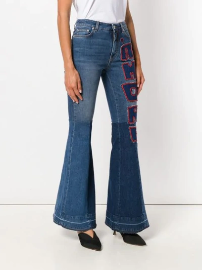 Shop Dolce & Gabbana Flared Amore Jeans In Blue