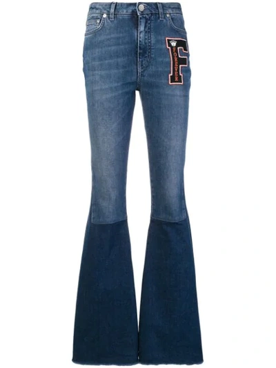 Shop Dolce & Gabbana Logo Patch Flared Jeans In Blue