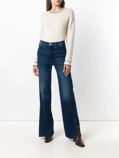 Shop Mother Side Slit Flared Jeans In 625 Tic Tongue And Chic