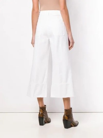 Shop Msgm Cropped Wide-leg Jeans In White