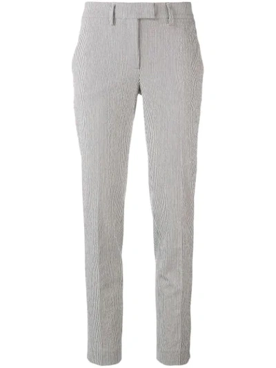 Shop Incotex Striped Tapered Trousers In White