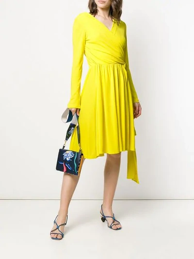 Shop Msgm Long Sleeve Wrap Dress In Yellow