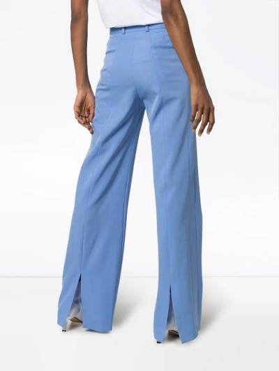 Shop Stella Mccartney High Waist Back Slit Wool Trousers In Blue
